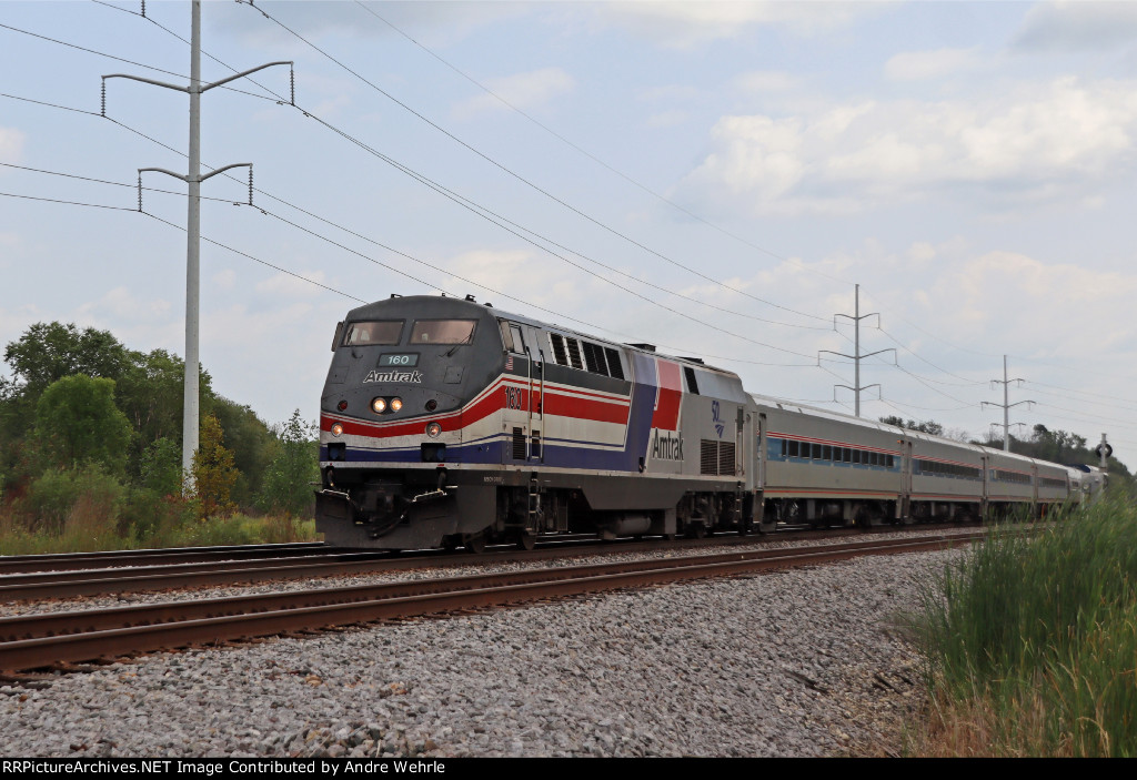 AMTK 160 "Pepsi Can" heritage leads westbound Borealis 1333